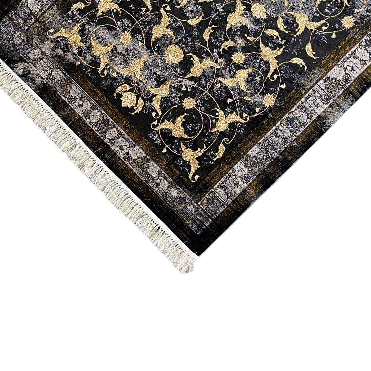 Alfombra Kenza 160x230 cm: esquina con adornos dorados y flecos blancos