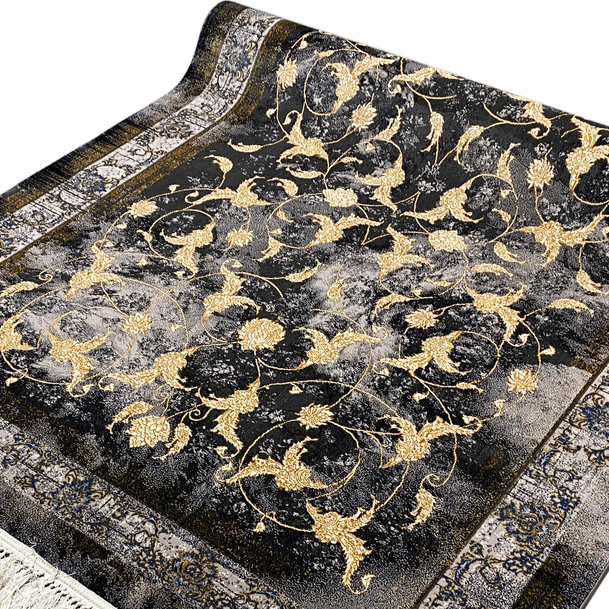 Alfombra de 160x230 cm en detalle: ornamentos dorados sobre un fondo oscuro jaspeado