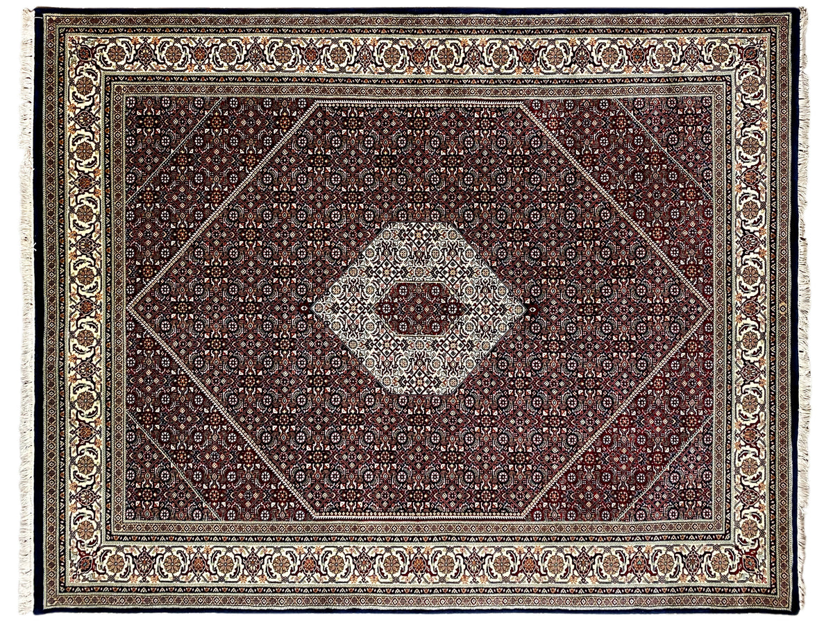 Alfombra de Bidjar frontal con medallón central y cenefa ricamente ornamentada