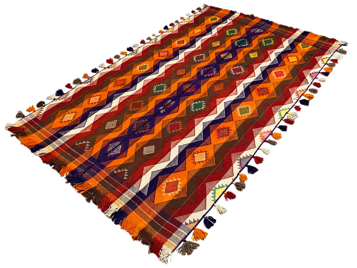 Alfombra bereber 237x150 cm diagonal, con líneas de zigzag y rombos de colores y flecos