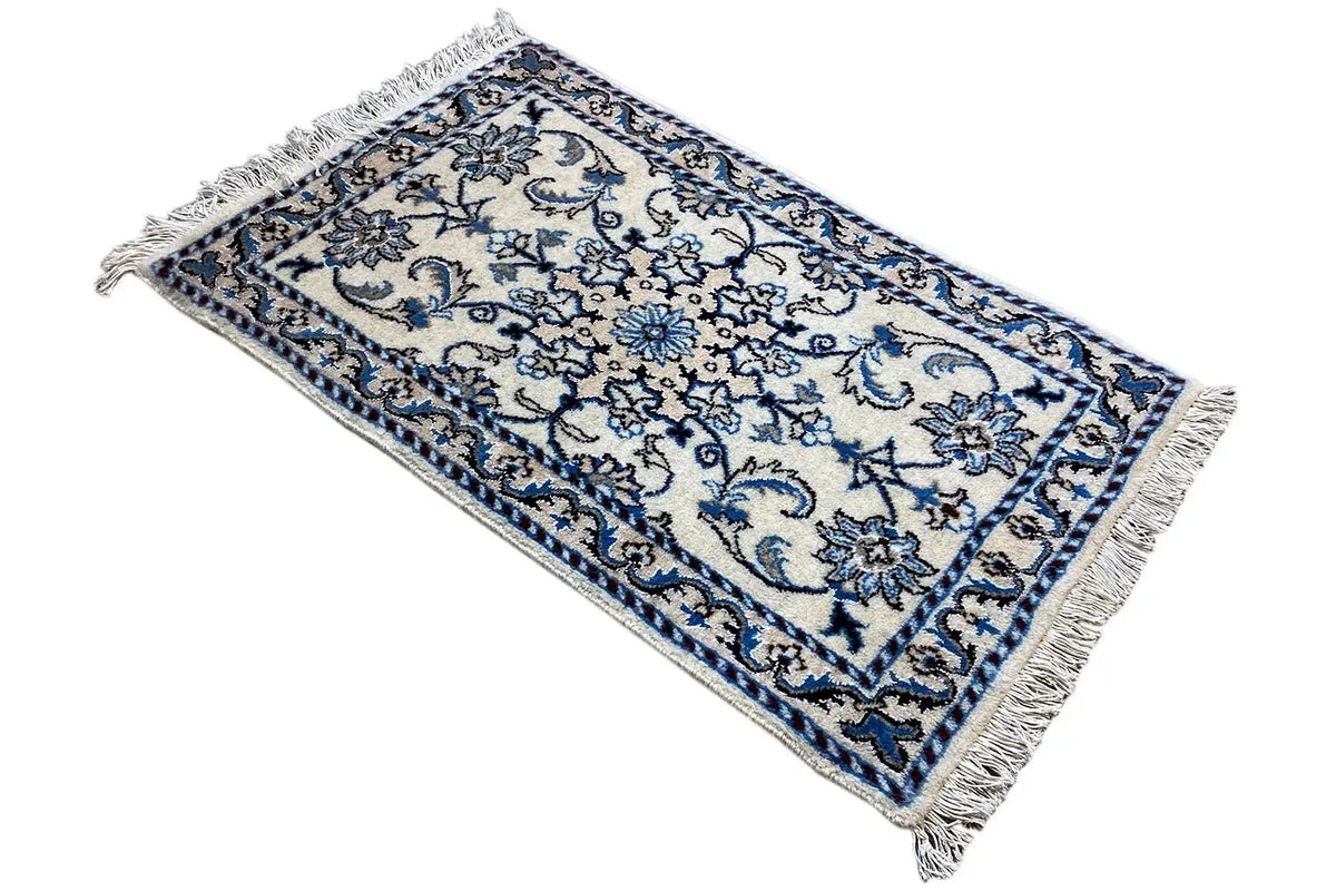 Alfombra persa (93x56 cm) con diseño ornamental azul y blanco, rectangular, con flecos