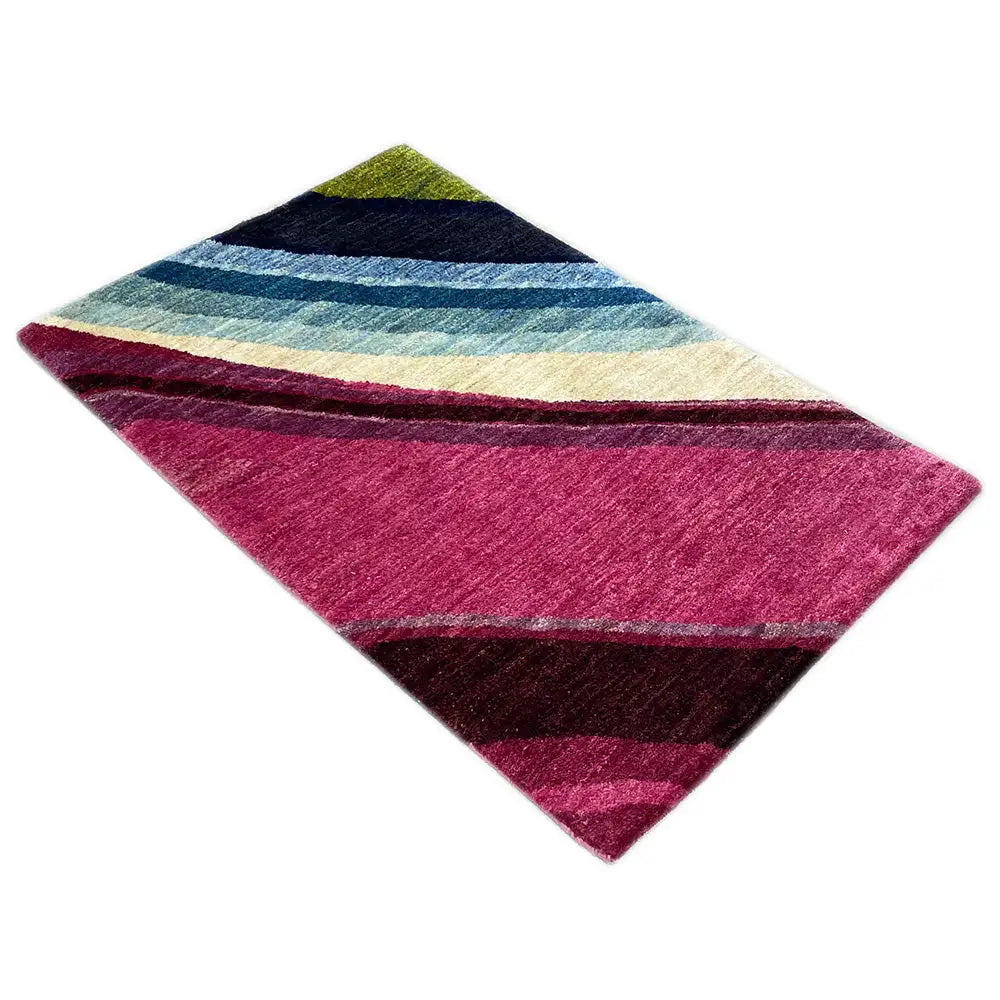 Alfombra Gabbeh con rayas diagonales en rosa, crema, azul y verde oscuro