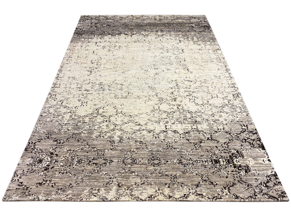 Alfombra rectangular con un diseño abstracto bicolor en beige y gris