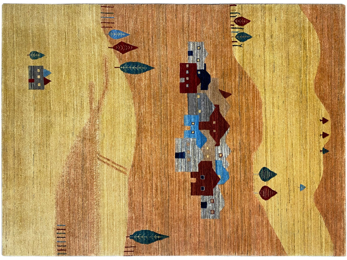 Teppichdetail mit Häusern und Ornamenten in Gelb, Braun, Blau und Rot