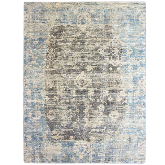 Alfombra rectangular, tejida plana, con motivos azul grisáceo desteñidos