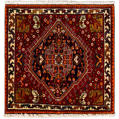 Alfombra Poshti de 60x60 cm, diseño rojo con borde naranja y flecos