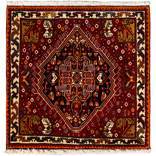 Alfombra Poshti de 60x60 cm, diseño rojo con borde naranja y flecos