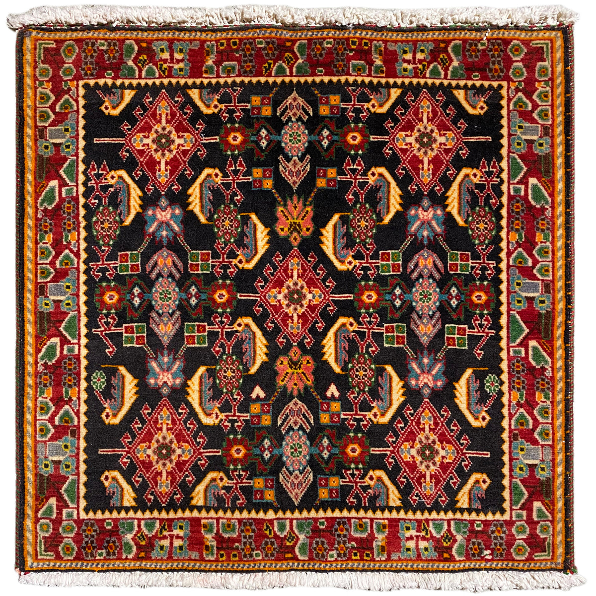 Alfombra Poshti con diseño geométrico: negro, tonos rojos, amarillos y verdes, 66x65 cm