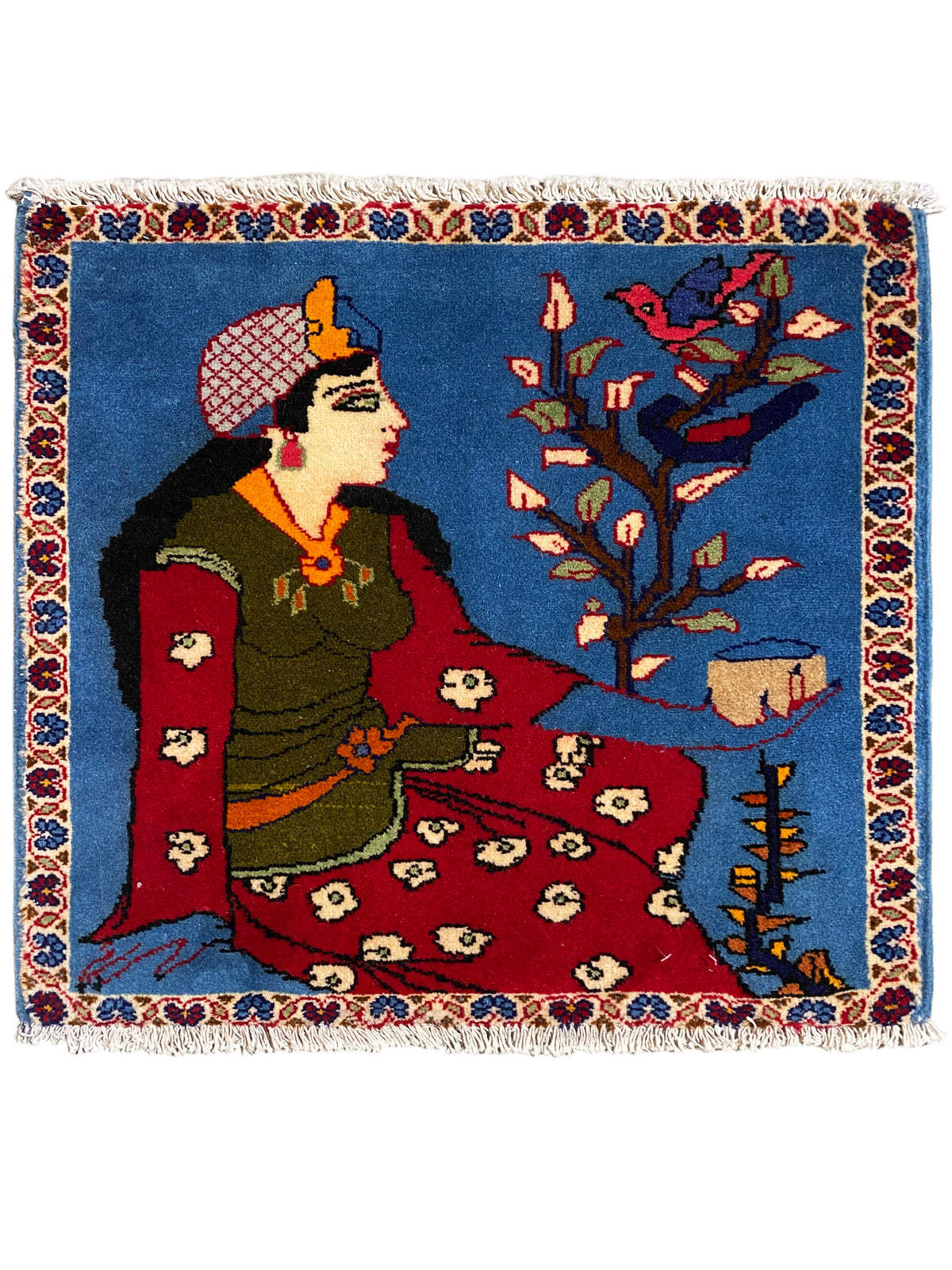 Alfombra Poshti de 65x63 cm con motivo oriental, superficie de fondo azul y flecos