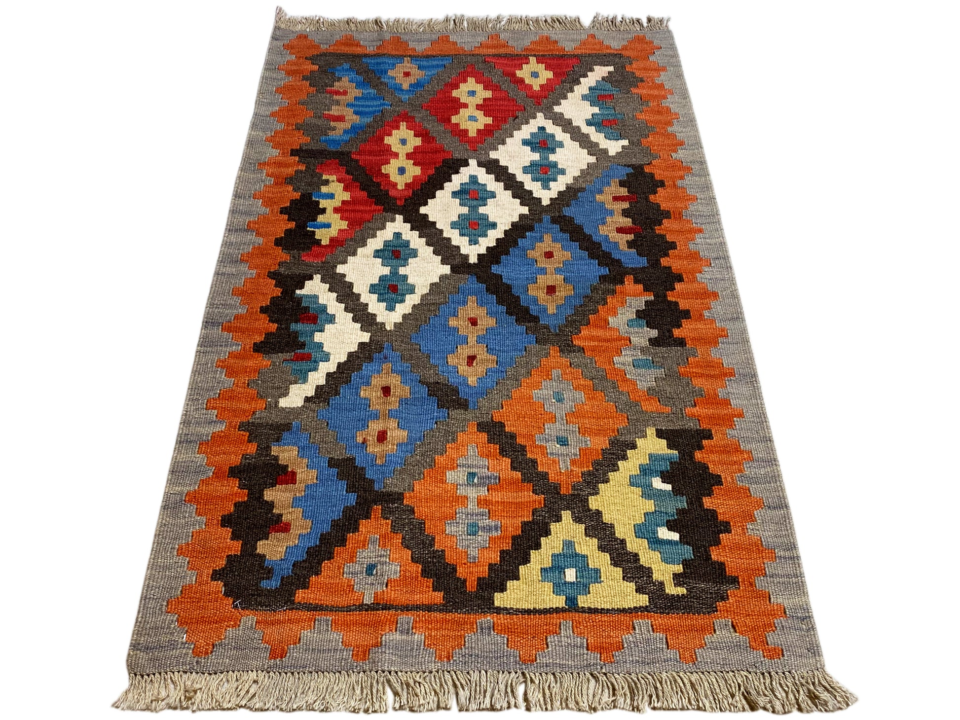 Boho Kelim Teppich 130x82, handversponnene Wolle mit farbigen Akzenten